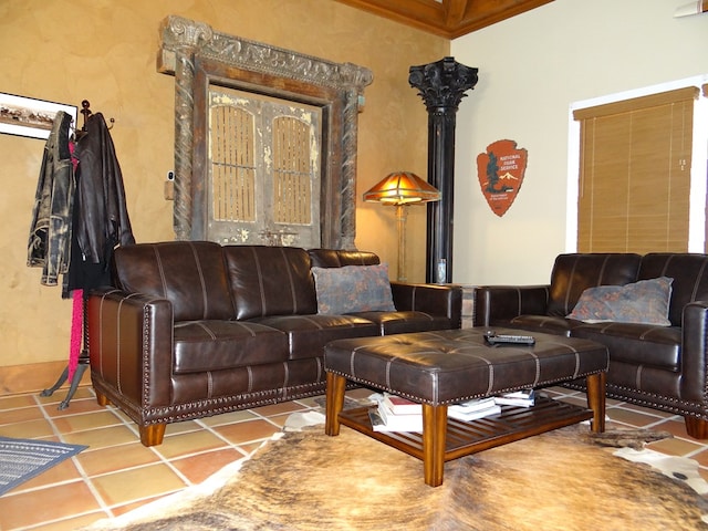 living room featuring tile patterned flooring and ornamental molding