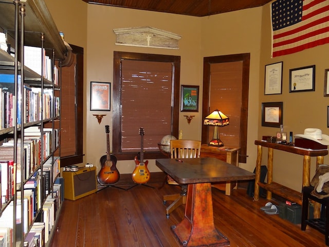 dining area with dark hardwood / wood-style flooring, wooden ceiling, and lofted ceiling