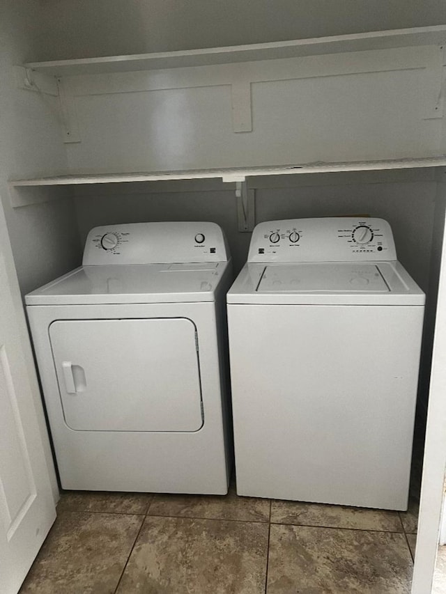 washroom featuring washer and dryer