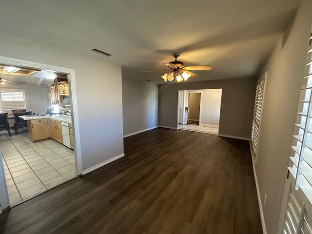 spare room featuring sink, ceiling fan, and light hardwood / wood-style floors