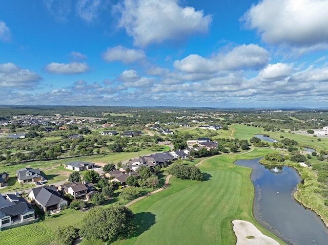 birds eye view of property featuring a residential view, a water view, and view of golf course