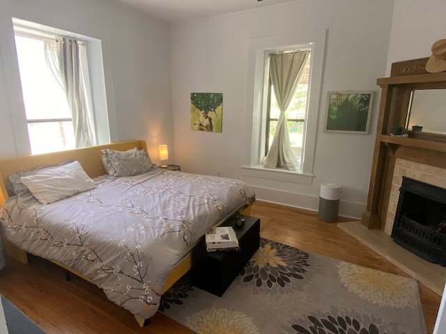 bedroom with hardwood / wood-style floors