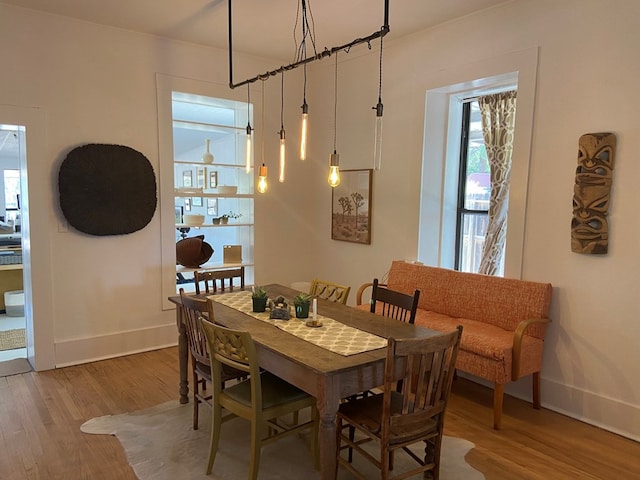 dining area featuring hardwood / wood-style floors