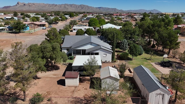 bird's eye view with a residential view and a mountain view