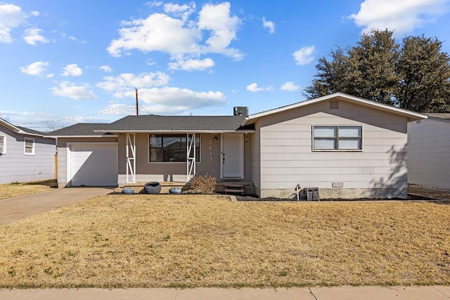 single story home featuring a garage and a front yard