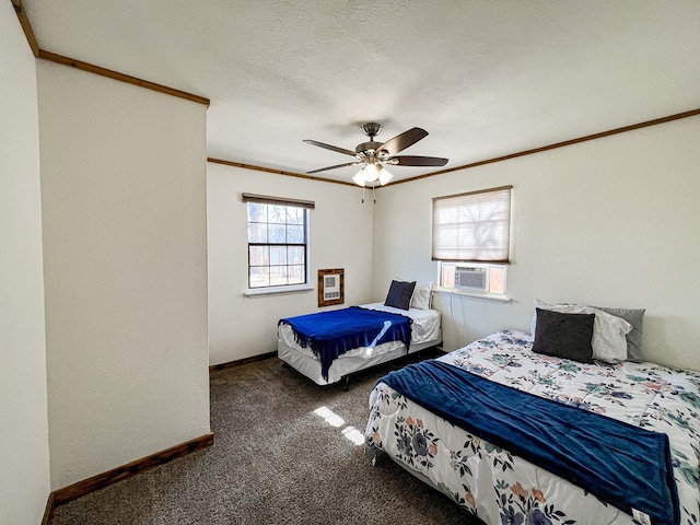 bedroom with crown molding, baseboards, carpet flooring, cooling unit, and a textured ceiling