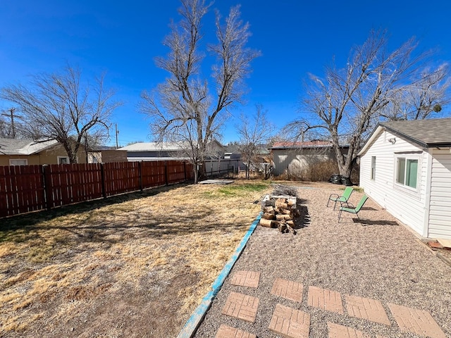 view of yard with a fenced backyard