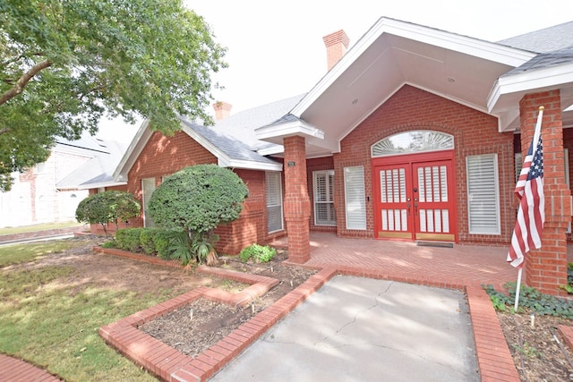 doorway to property with french doors