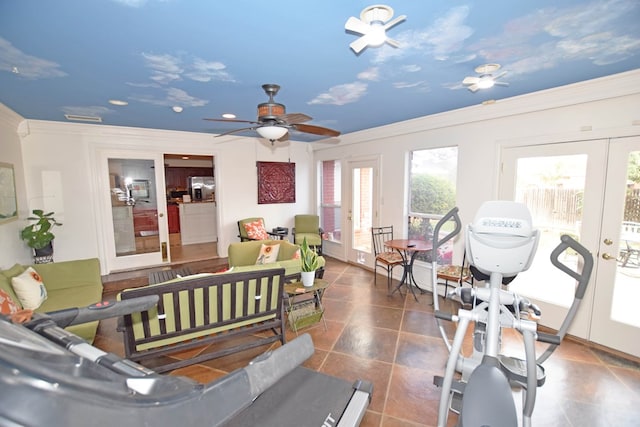 tiled living room with ceiling fan, french doors, and ornamental molding