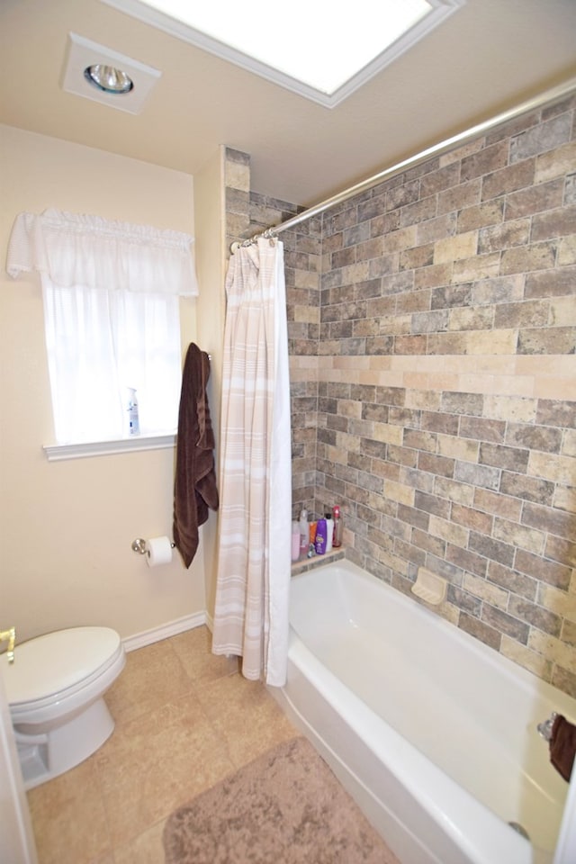 bathroom with shower / bathtub combination with curtain and toilet