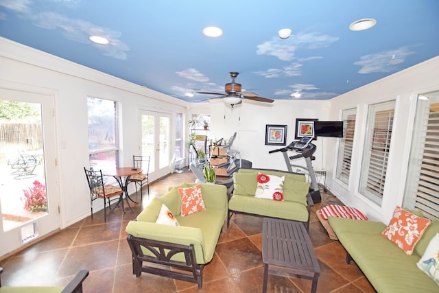 sunroom / solarium with french doors and ceiling fan