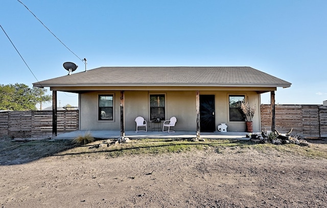 view of front facade with a patio area