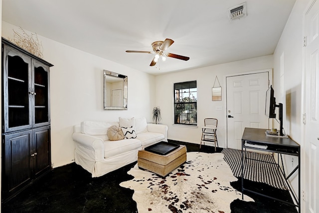 living room with ceiling fan