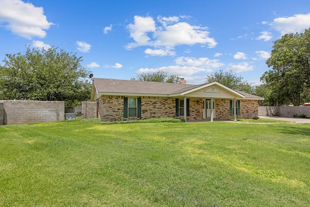 ranch-style house with a front lawn