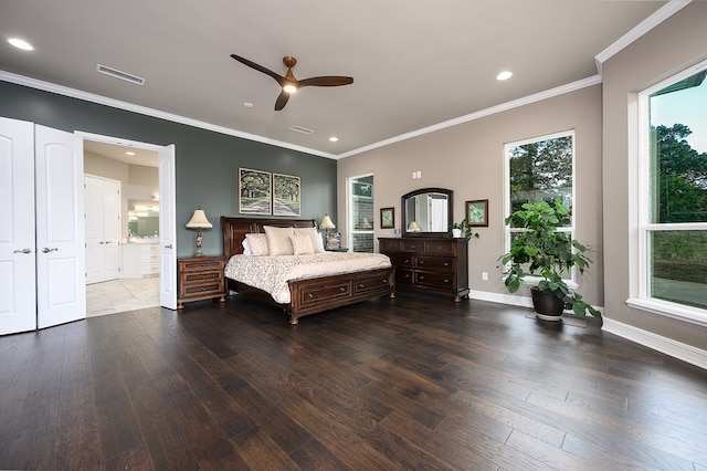 bedroom with hardwood / wood-style flooring, ceiling fan, and ornamental molding