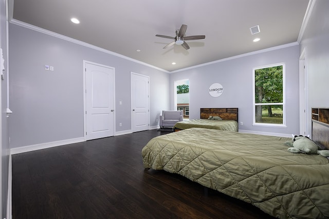 bedroom featuring multiple windows, ornamental molding, ceiling fan, and dark wood-type flooring