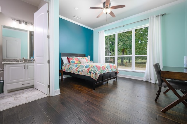 bedroom with ceiling fan, sink, ornamental molding, and dark wood-type flooring