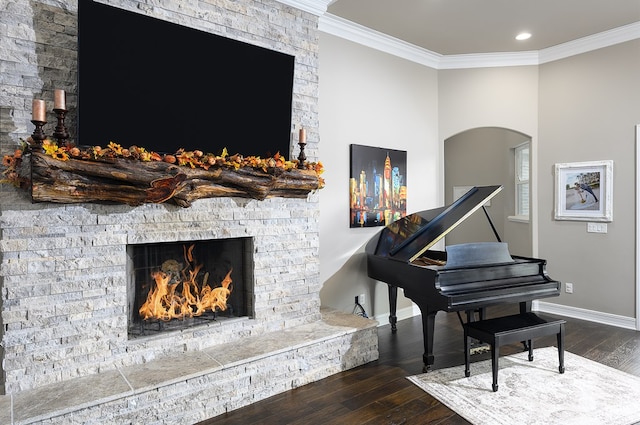 miscellaneous room featuring dark hardwood / wood-style floors and ornamental molding