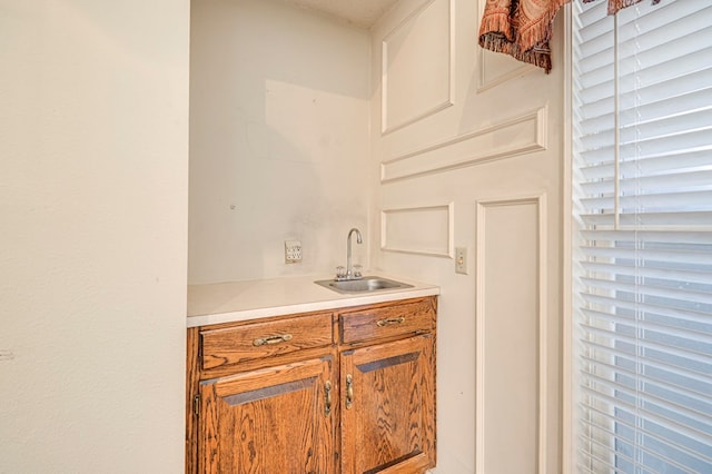 bar featuring a sink