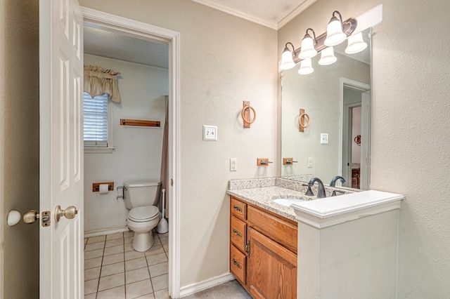 bathroom featuring vanity, baseboards, ornamental molding, tile patterned floors, and toilet