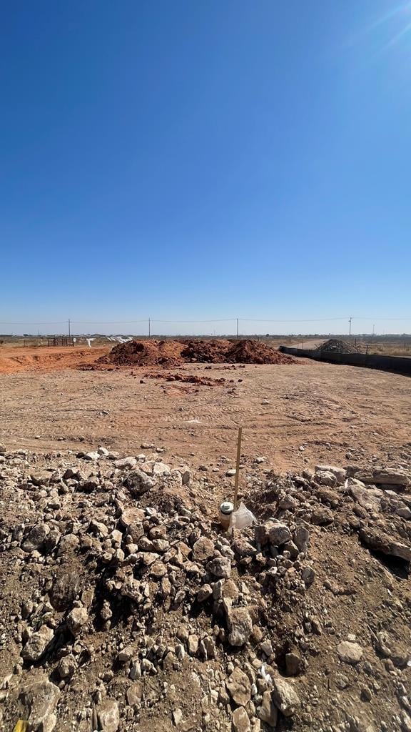 view of yard with a rural view