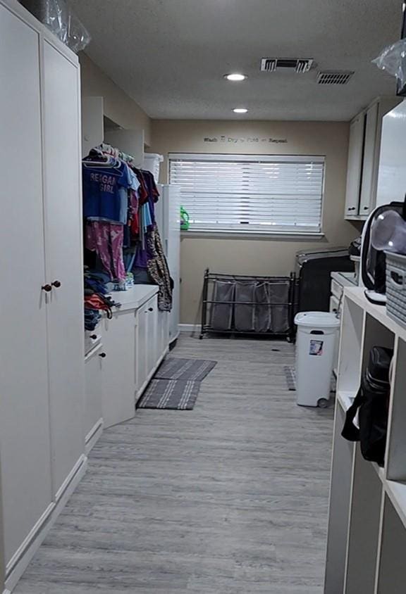 mudroom featuring light hardwood / wood-style flooring