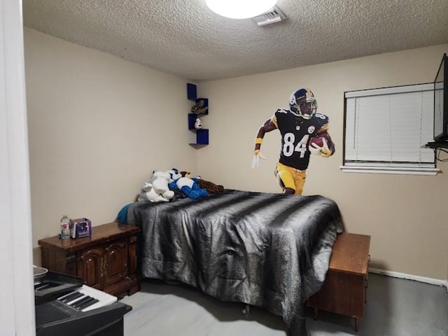 bedroom with a textured ceiling