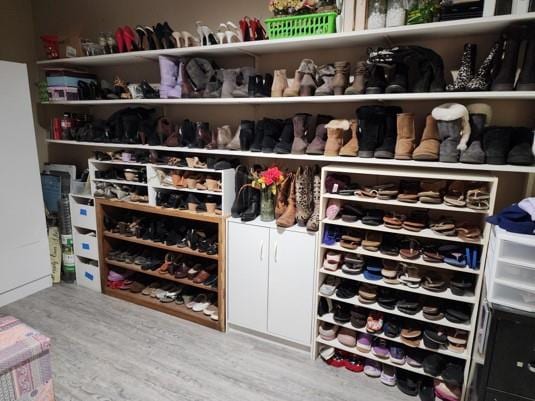 spacious closet with wood-type flooring