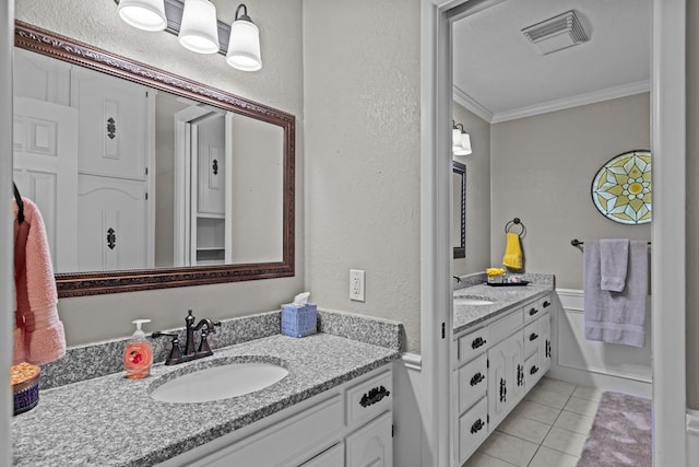 bathroom with vanity, tile patterned floors, and ornamental molding