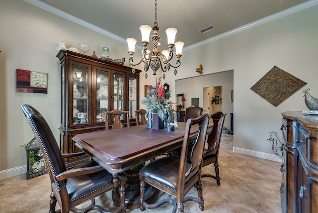 tiled dining area with a notable chandelier and crown molding