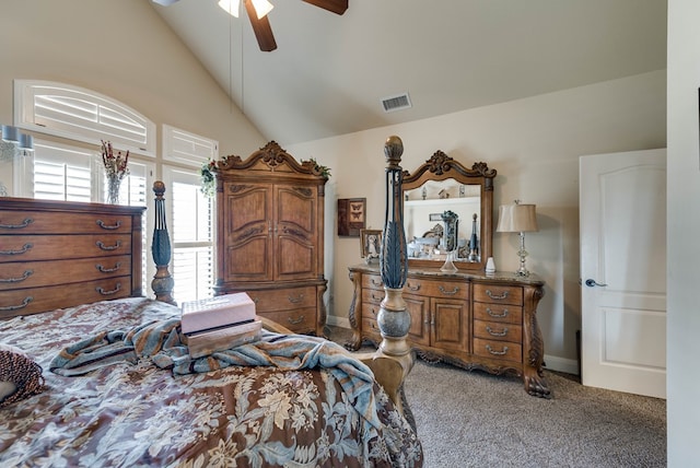 carpeted bedroom featuring ceiling fan and vaulted ceiling