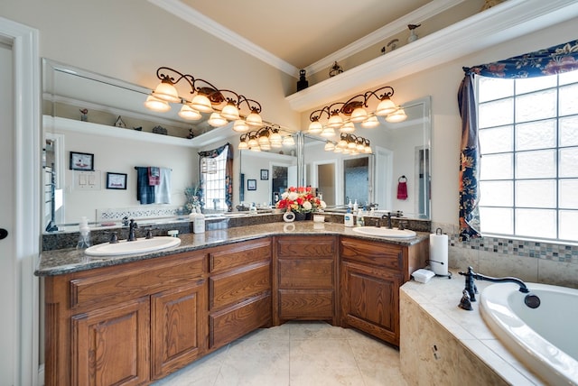 bathroom with tile patterned floors, plenty of natural light, and vanity