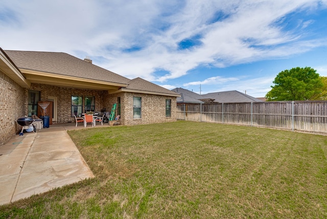 view of yard with a patio area