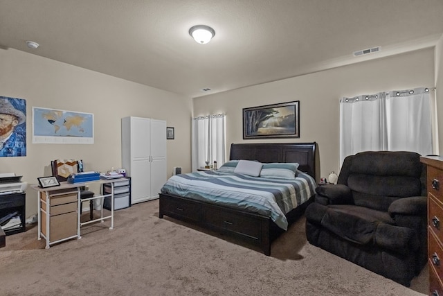 carpeted bedroom with visible vents