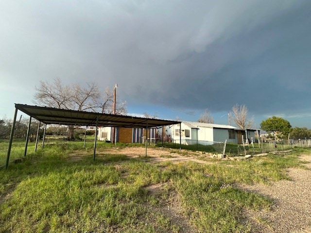 view of yard featuring a carport