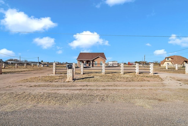 view of yard with a rural view