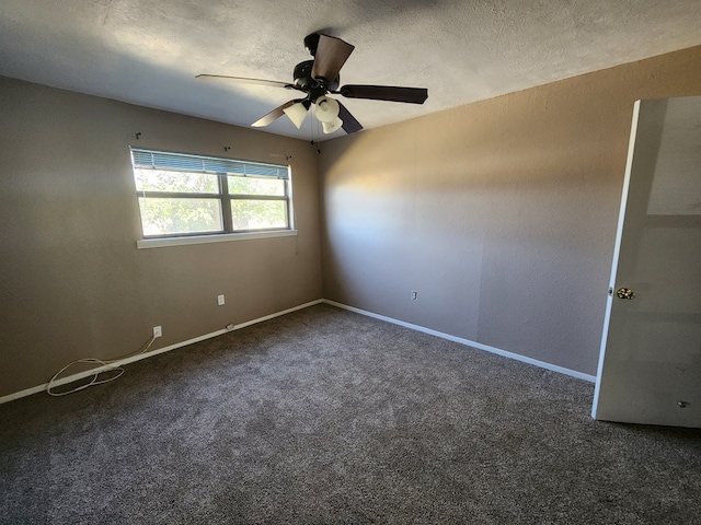 carpeted empty room with a textured ceiling and ceiling fan