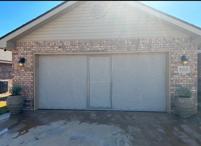 garage featuring central AC unit