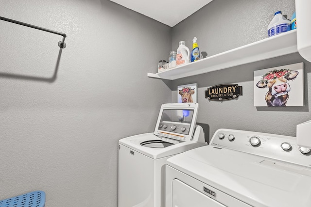 washroom featuring independent washer and dryer