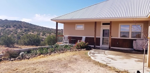 exterior space with a mountain view