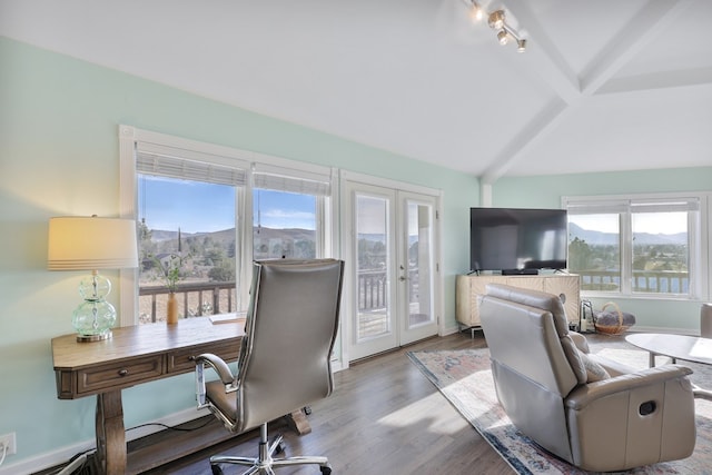 office featuring lofted ceiling with beams, french doors, baseboards, and wood finished floors