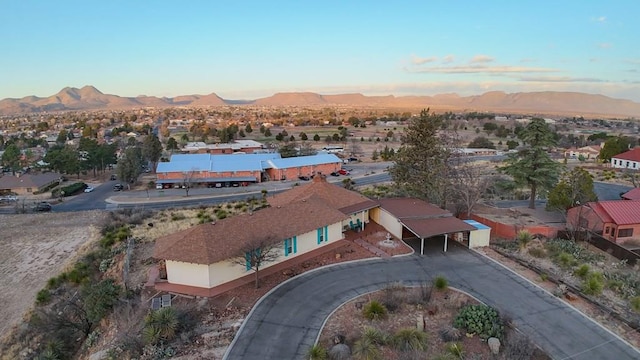 birds eye view of property with a residential view and a mountain view