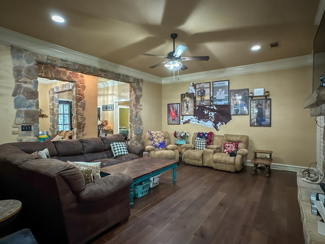 living room featuring ceiling fan, ornamental molding, and dark hardwood / wood-style flooring