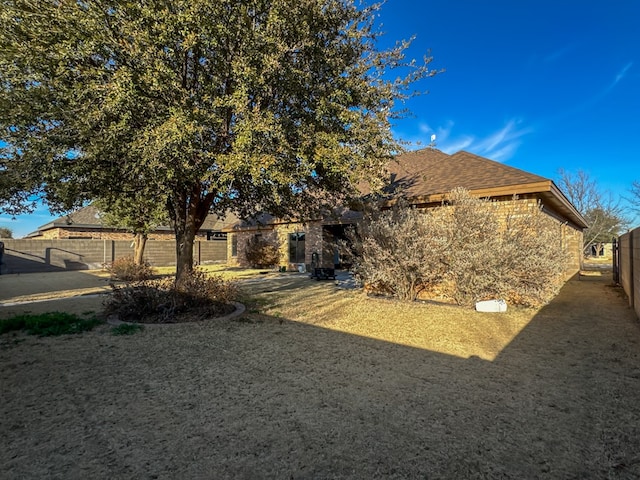 exterior space with a front yard