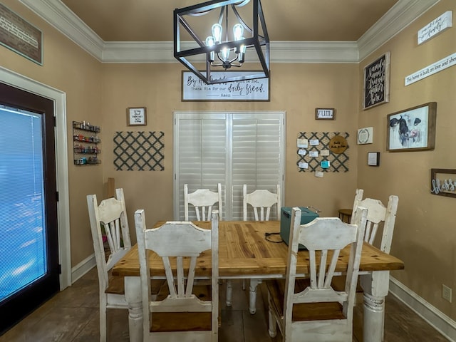 dining space with an inviting chandelier and ornamental molding