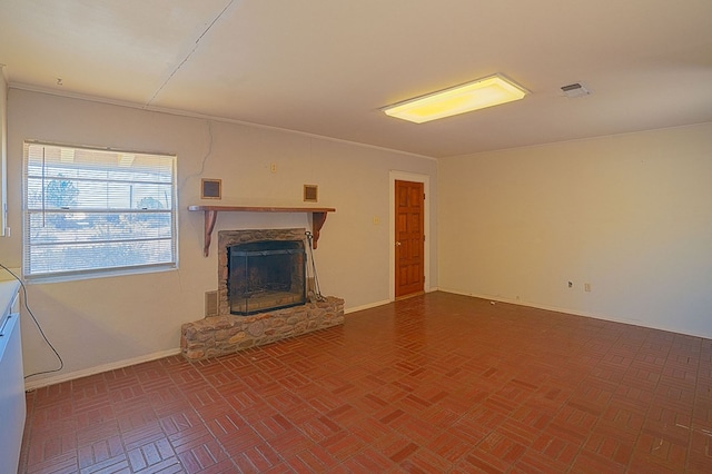 unfurnished living room with a fireplace