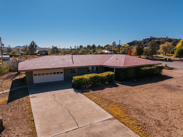 single story home with a garage