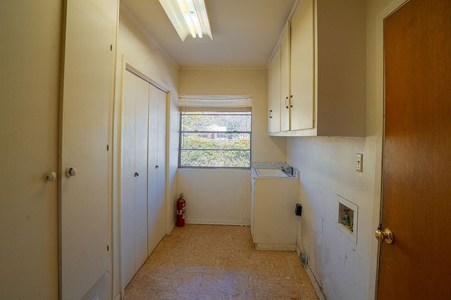 laundry room with cabinets and hookup for a washing machine