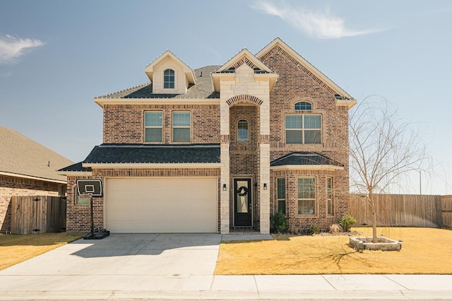 view of front of home with concrete driveway, brick siding, an attached garage, and fence