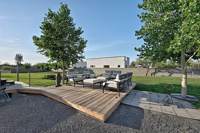 view of patio / terrace with a wooden deck and an outdoor hangout area